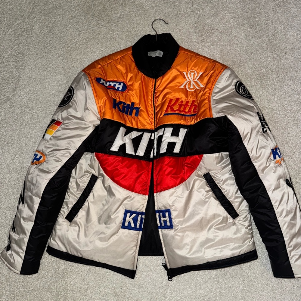 Kith Black and Orange Puffer Jacket